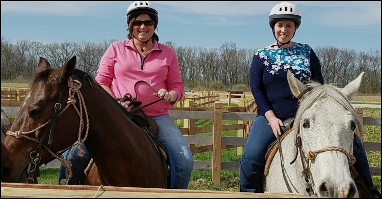 Sara and Lisa on horses